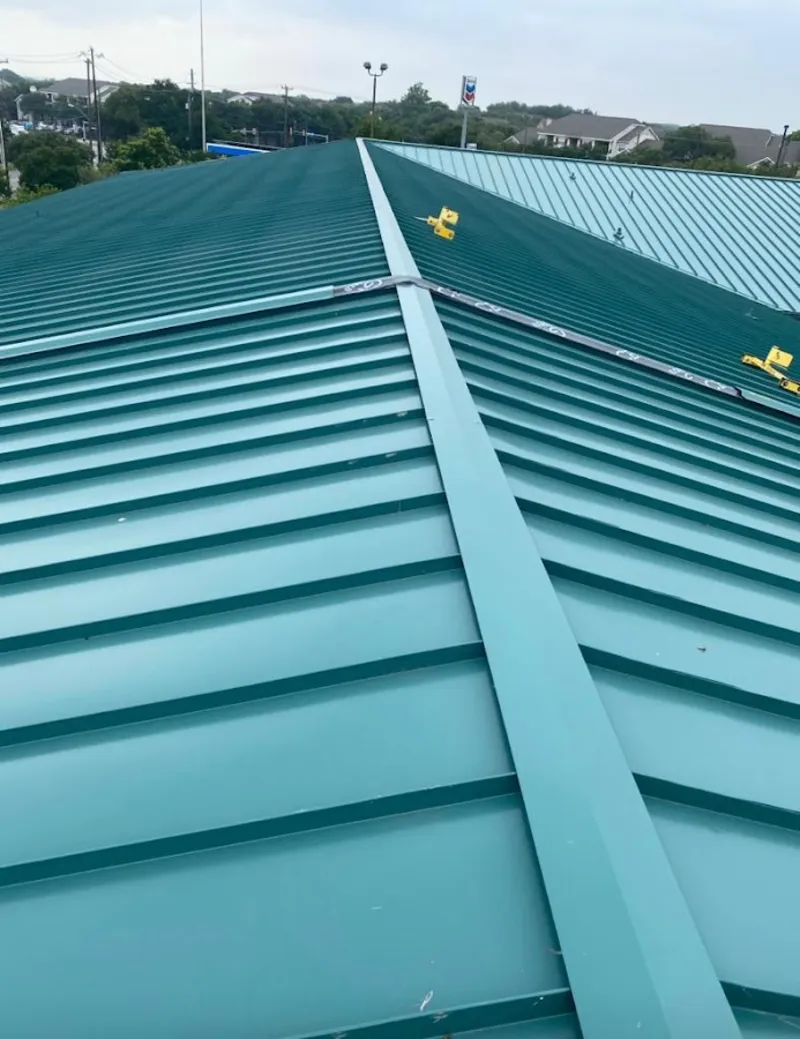 Green commercial metal roof ridge and valley for Metal Roof Repair in Cascade